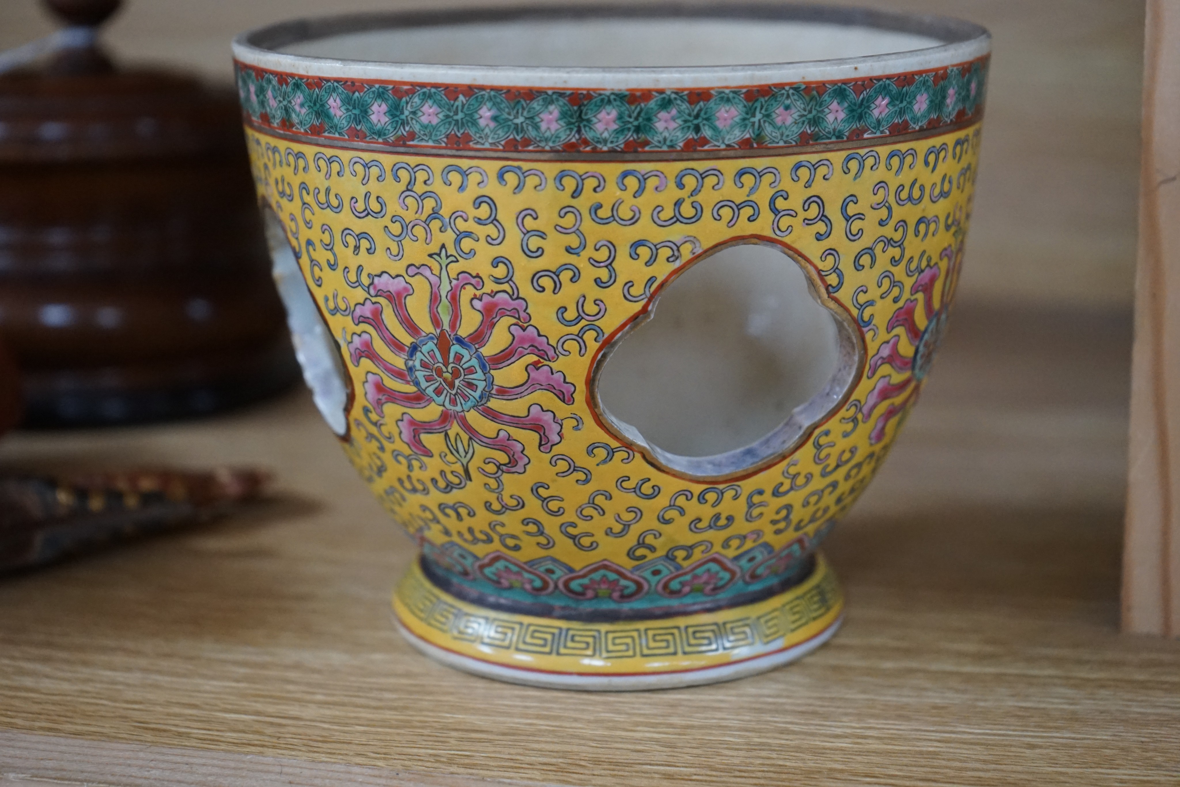 A Japanese porcelain cylindrical vase and a Chinese yellow ground two-section vessel and cover, 29cm